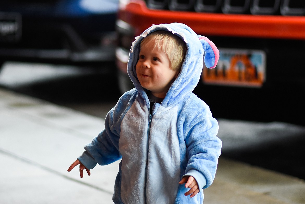 A little bunny smiles up at his mother in downtown Whitefish during Halloween Wednesday. (Daniel McKay/Whitefish Pilot)