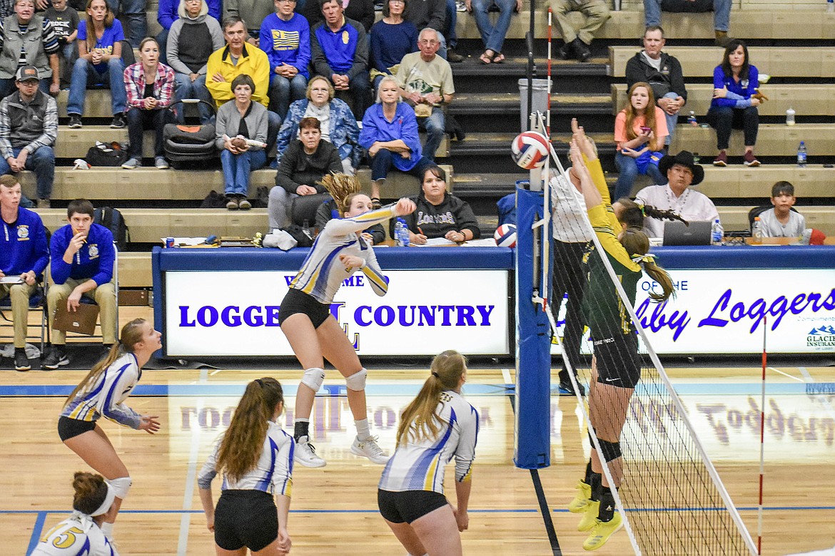 Libby senior Jayden Winslow slams home the final kill of the Lady Loggers&#146; three-set championship win against Whitefish Saturday, securing the 2018-2019 Northwest A District Championship win. (Ben Kibbey/The Western News)