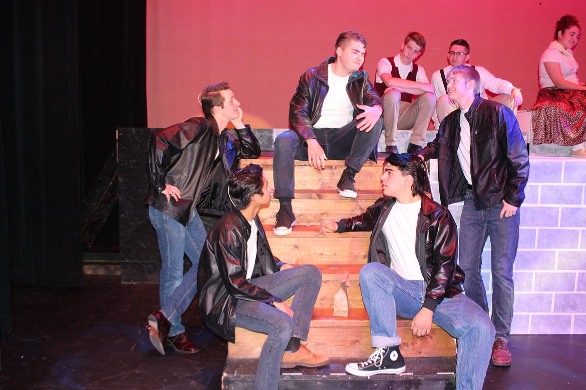 Cheryl Schweizer/Columbia Basin Herald

Danny (Mark Fedorchuck, center) and the T-Birds talk about what happened over the summer in the Moses Lake High School production of &#145;Grease.&#146; It opens Thursday.