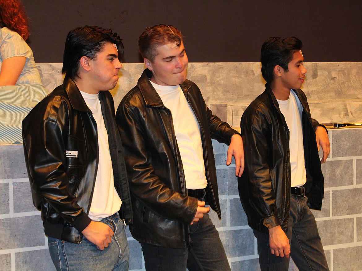 Cheryl Schweizer/Columbia Basin Herald
Danny (Mark Fedorchuck, center) and the T-Birds survey the scene at Rydell High in the Moses Lake High School production of &#145;Grease,&#146; opening Thursday.