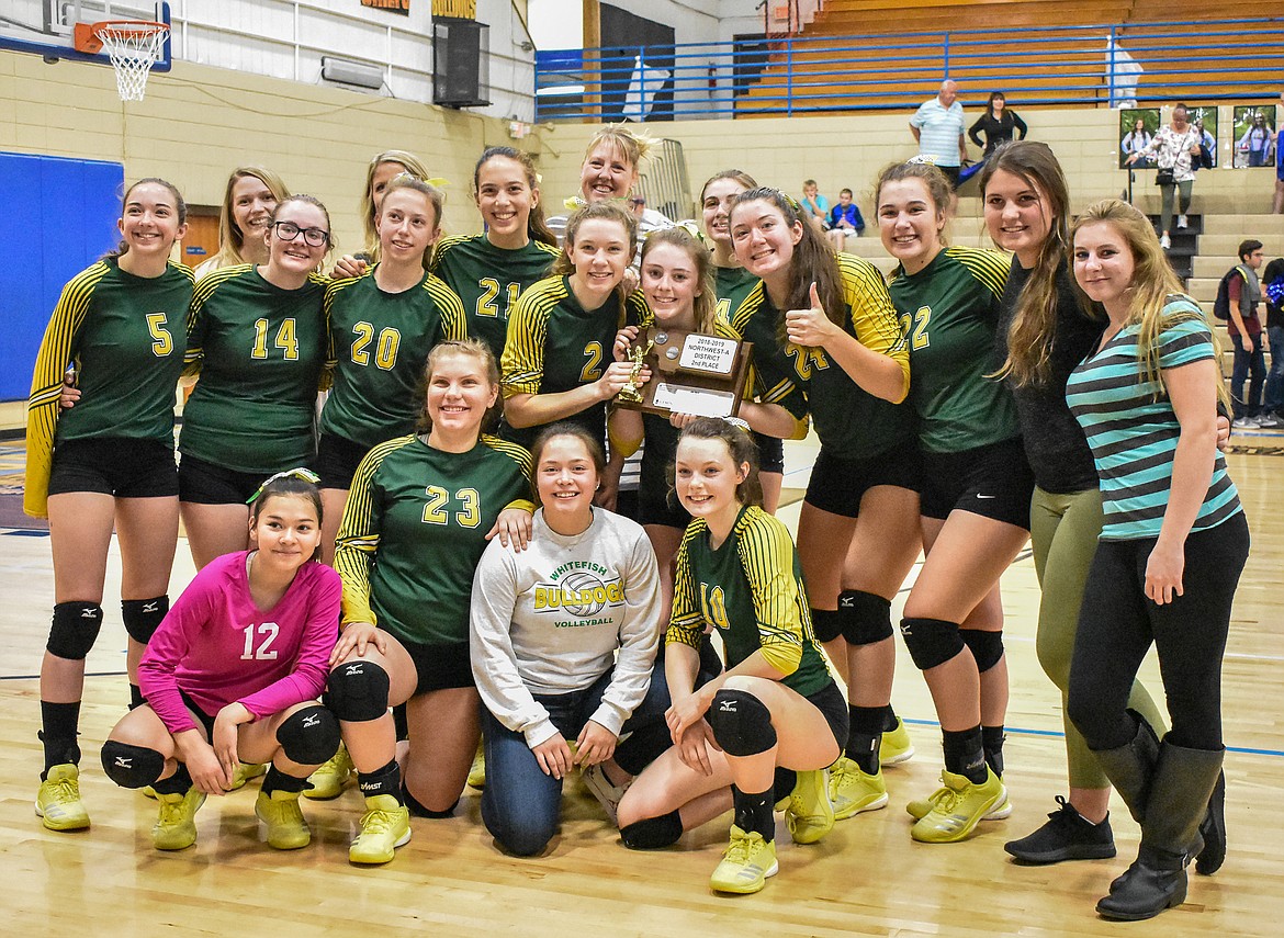 The Lady Bulldogs pose with their 2nd place trophy after their championship match against Libby Saturday, Oct. 27. (Ben Kibbey/The Western News)