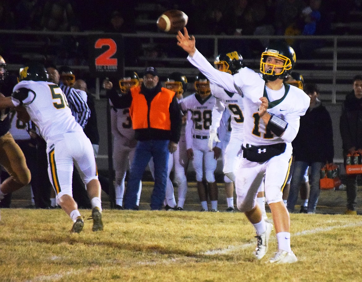 Mark Anderson fires a pass against Dillon in Whitefish's 27-7 playoff loss on Friday. (J.P. Plutt/Dillon Tribune)