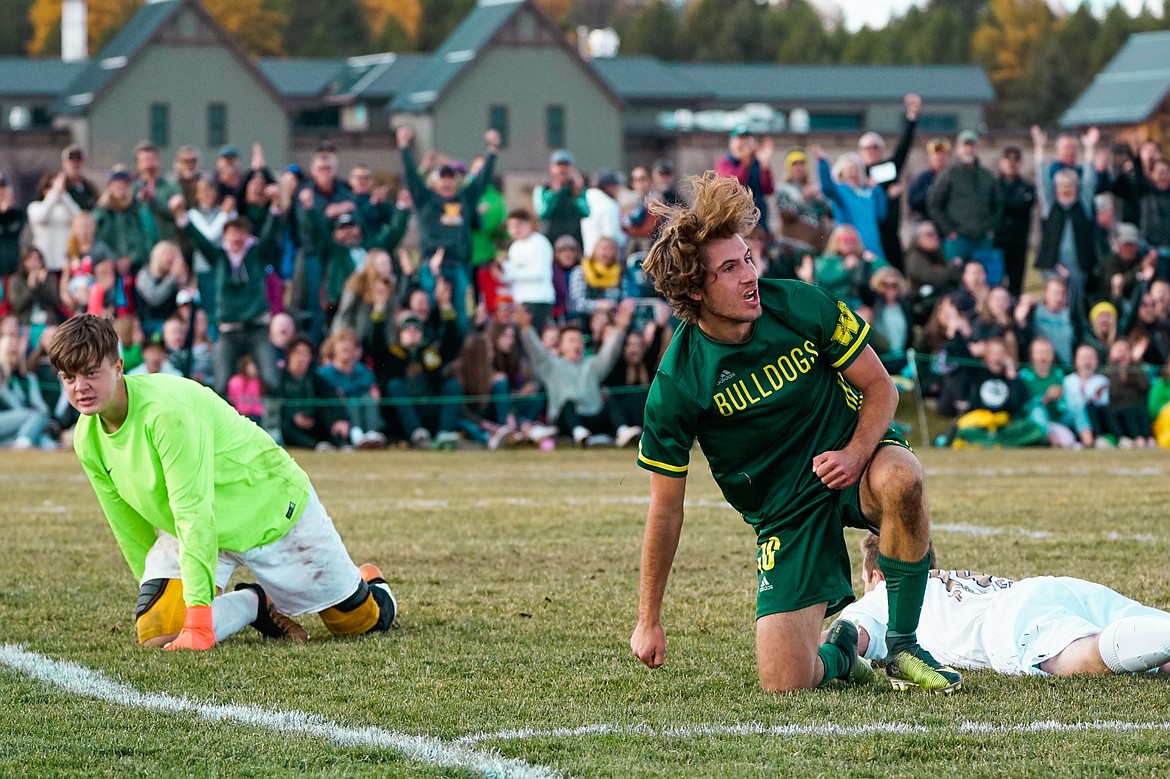 Xander Burger celebrates after one of his five goals agasint Polson in the Class A state title match on Saturday.