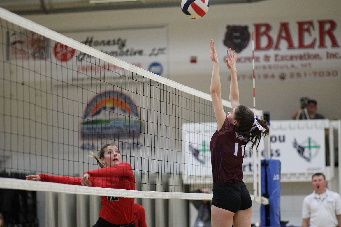 Cat Sorren Reese blocks a ball from a Darby player. The second-seeded Clark Fork Lady Mountain Cats faced the No. 3 Lady Tigers on Friday and won 25-18, 25-19, 25-18.