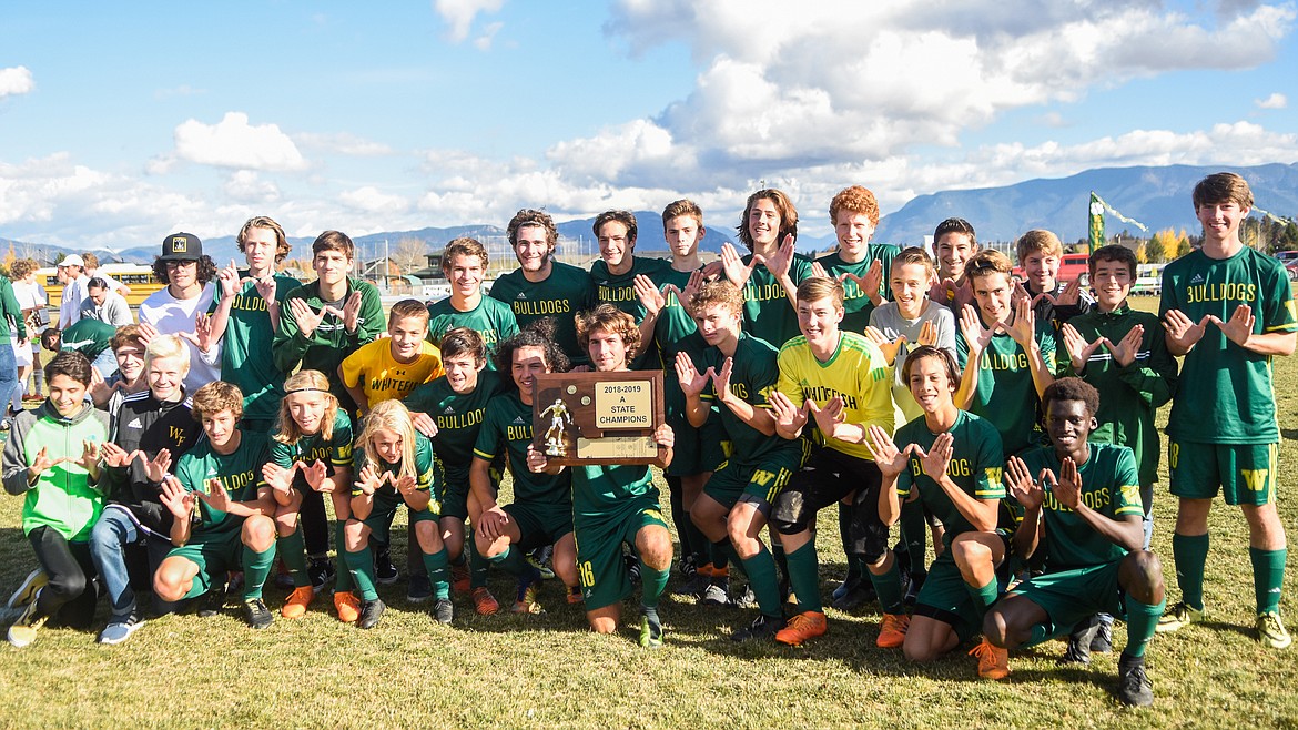 The Bulldogs celebrate their state title with their fellow students Saturday at Smith Fields.