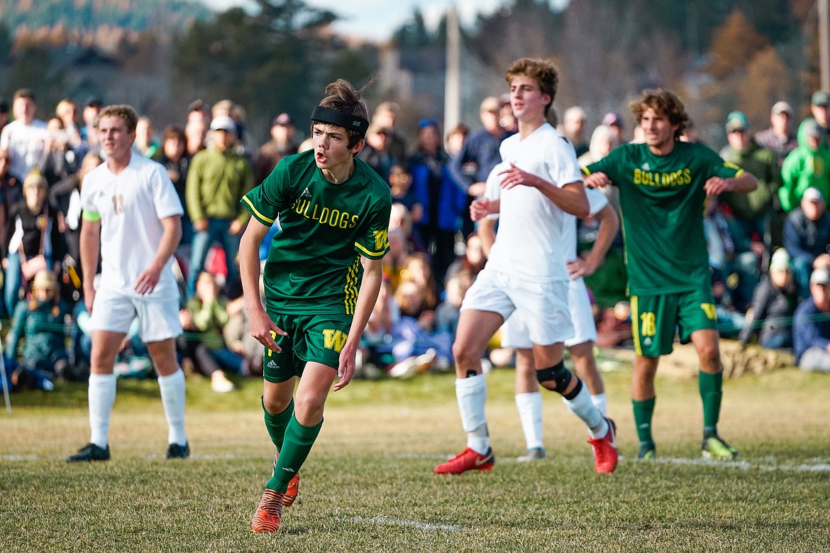 Ian Lacey celebrates after nailing a penalty kick in the second half of the Class A state title match against Polson.