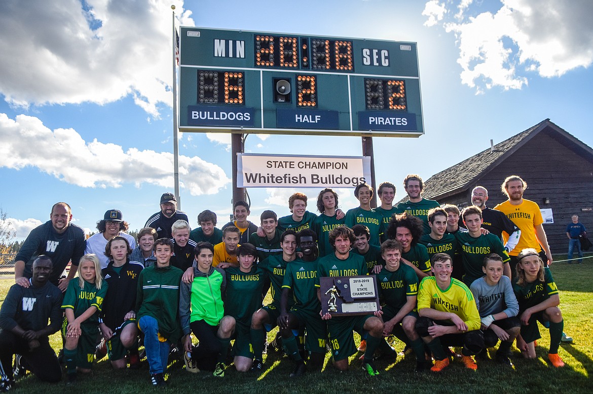 The Bulldogs celebrate their 6-2 Class A State Championship victory over Polson.