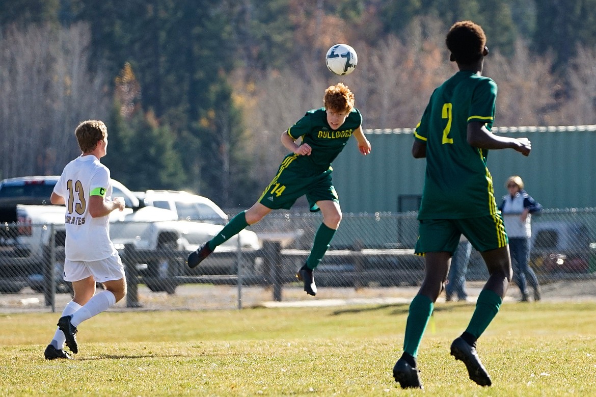 Ian Grover rises for the header during the Bulldogs&#146; 6-2 victory over Polson in the Class A state title match Saturday.