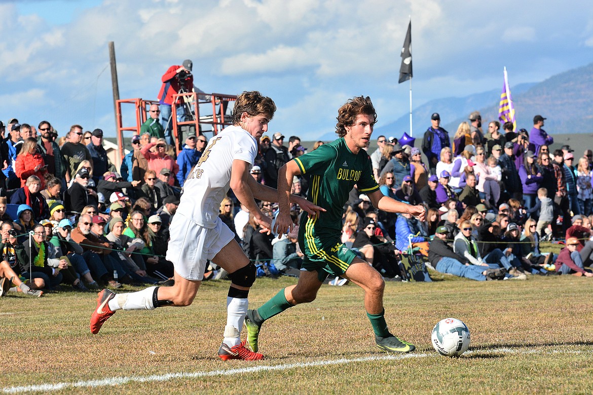 Bulldog Xander Burger dribbles the ball against Polson Saturday at Smith Fields. (Photo courtesy Jeff Doorn)