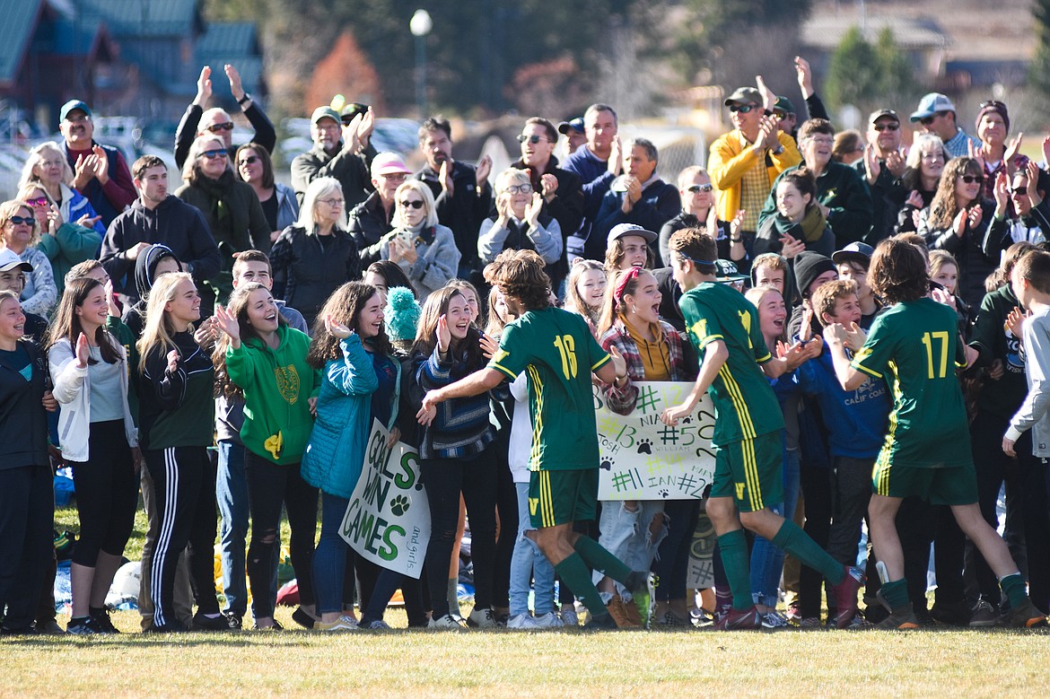 The Bulldogs celebrate their state title with their fellow students Saturday at Smith Fields.