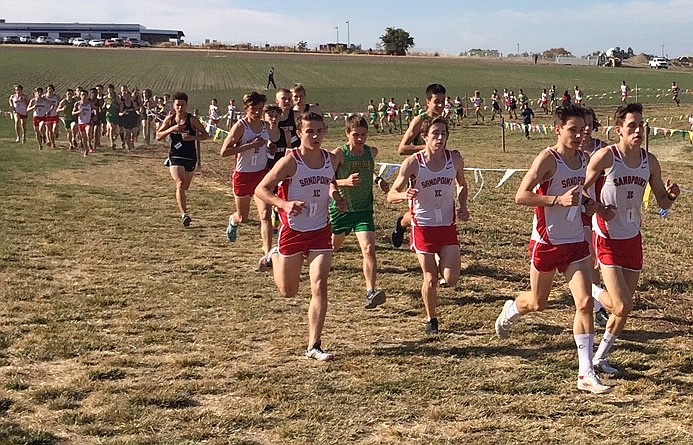 (Courtesy photo)
Pictured from right to left are Ephriam Weisz, Jett Lucas (partially obscured), Nikolai Braedt, Seth Graham, Brady Nelsen and Kieran Wilder, all of whom were named to the District 1 Boys Cross Country team recently. The Bulldogs had a whopping half of the top 12 times in the district, from 5A to 1A, a testament to the depth of the team. Runner of the Year was Coeur d&#146;Alene Senior Chad Humphreys, followed by: Braedt, Sandpoint, 10; Lucas, Sandpoint, 10; Weisz, Sandpoint, 12; Cameron Parkes, Priest River Lamanna, 12; Carter Gordon, Lake City, 11; Wilder, Sandpoint, 12; Nelsen, Sandpoint, 11; Graham, Sandpoint, 11; Caleb Gleason, Priest River Lamanna, 12; Hunter Smith, Bonners Ferry, 11; Logan Davis, Coeur d&#146;Alene Charter, 9; Logan Hunt, Timberlake, 11.