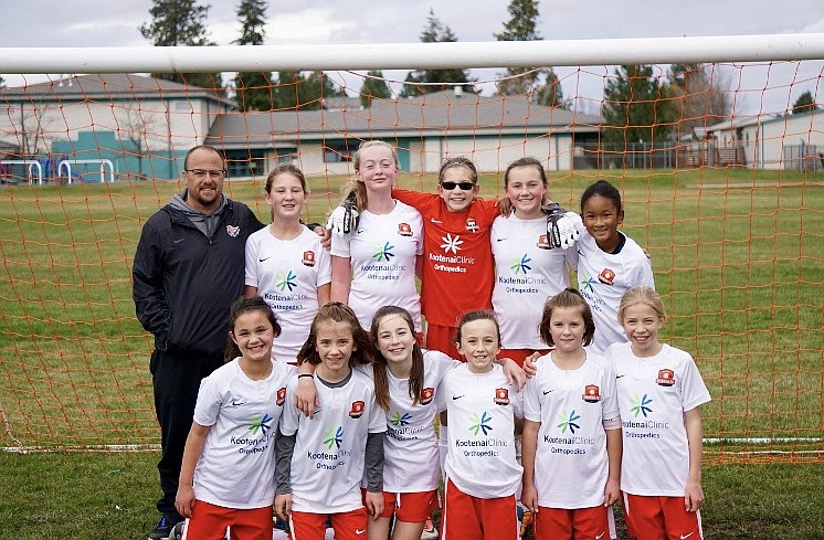 Courtesy photo
The Thorns &#146;07 girls soccer team completed its fall season on Saturday. In the front row from left are Bella Berzoza, Malina Biondo, Zayda Voigt, Olivia May, Mallory Judd and Emma Decker; and back row from left, coach Kirk Hartzell, Allie Van Ditto, Nicole Stewart, Danielle Todd, Emma Singleton and Jamie Lawrence.