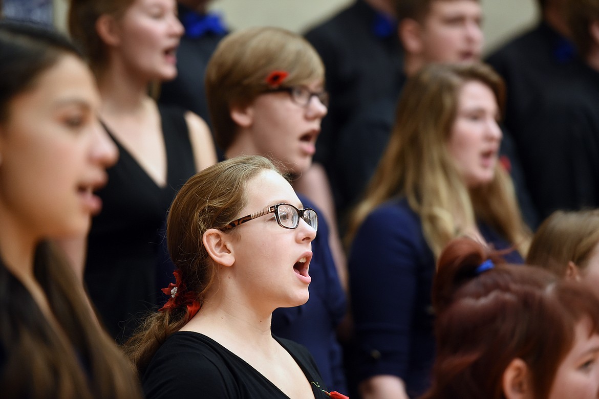 Columbia Falls freshman Grace Cincis and members of the choir rehearse before the start of the Veterans Day Assembly on Friday, November 9.(Brenda Ahearn/Daily Inter Lake)