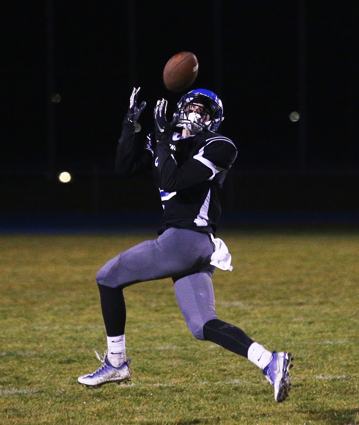 Coeur d&#146;Alene wide receiver Jake Brown catches a deep pass against Borah.