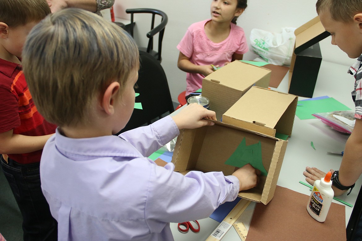 (Photo by MARY MALONE)
Idaho Hill Elementary second-graders recently built habitats for clay animals they had made as part of the school's STEAM program.