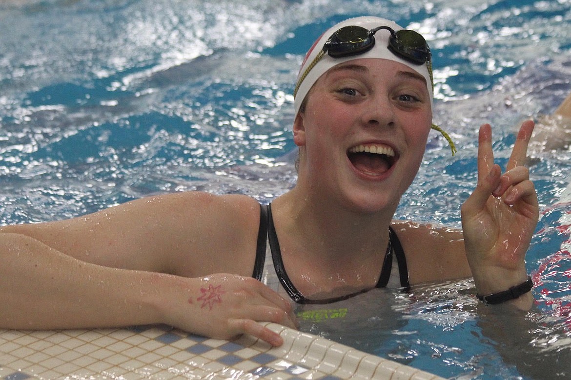 (Photo by JACINDA BOKOWY)
Mikayla Schoening is all smiles in the pool last weekend in Boise, where she claimed two state titles during a strong meet.