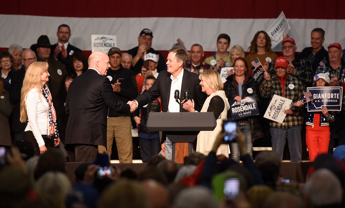 Congressman Greg Gianoforte shakes hands with Senator Steve Daines at the Get Out the Vote Rally in Kalispell, Montana, on Monday, November 5.&#160;(Brenda Ahearn/Daily Inter Lake)