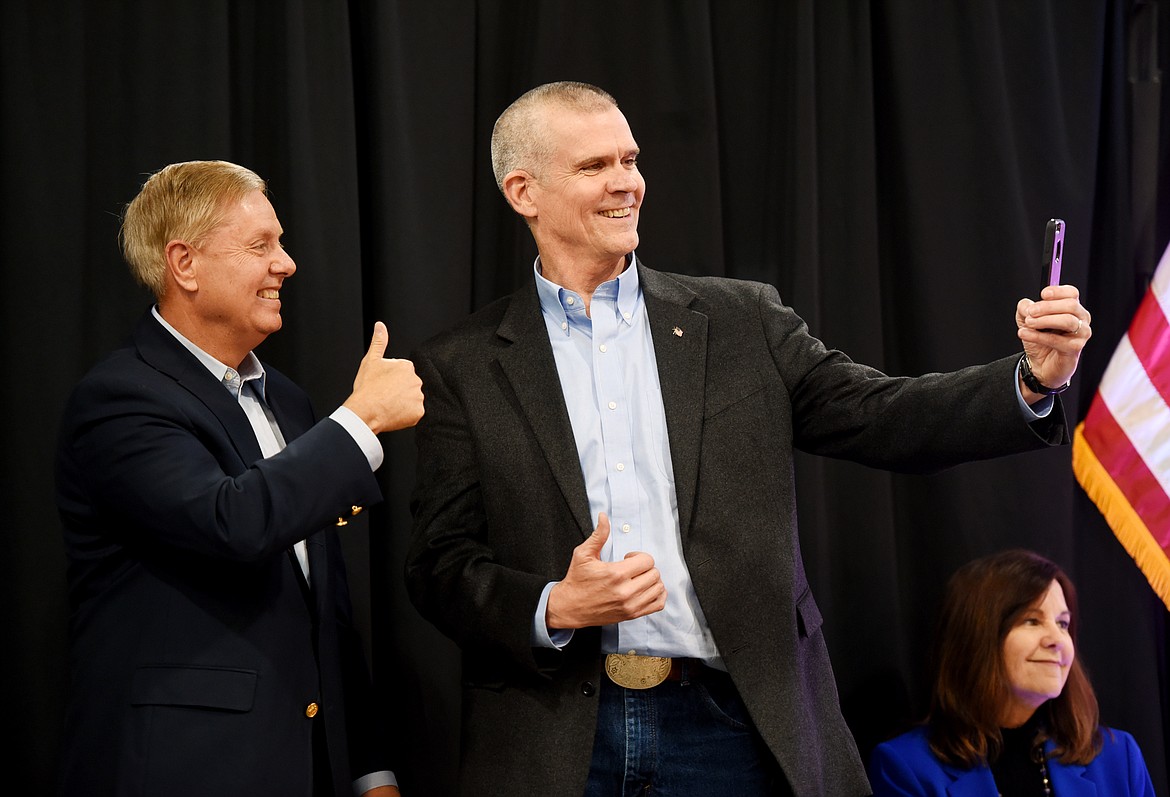 Republican candidate Matt Rosendale takes a selfie with Senator Lindsey Graham at the Get Out the Vote Rally in Kalispell, Montana, on Monday, November 5.&#160;(Brenda Ahearn/Daily Inter Lake)