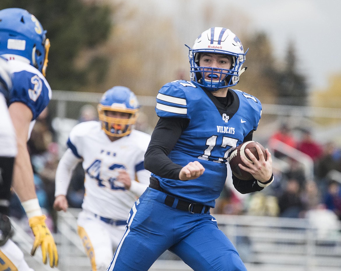 Columbia Falls&#146; quarterback Drew Morgan scrambles for extra yards against Fergus County Saturday in the state A playoffs. (Chris Peterson photo)