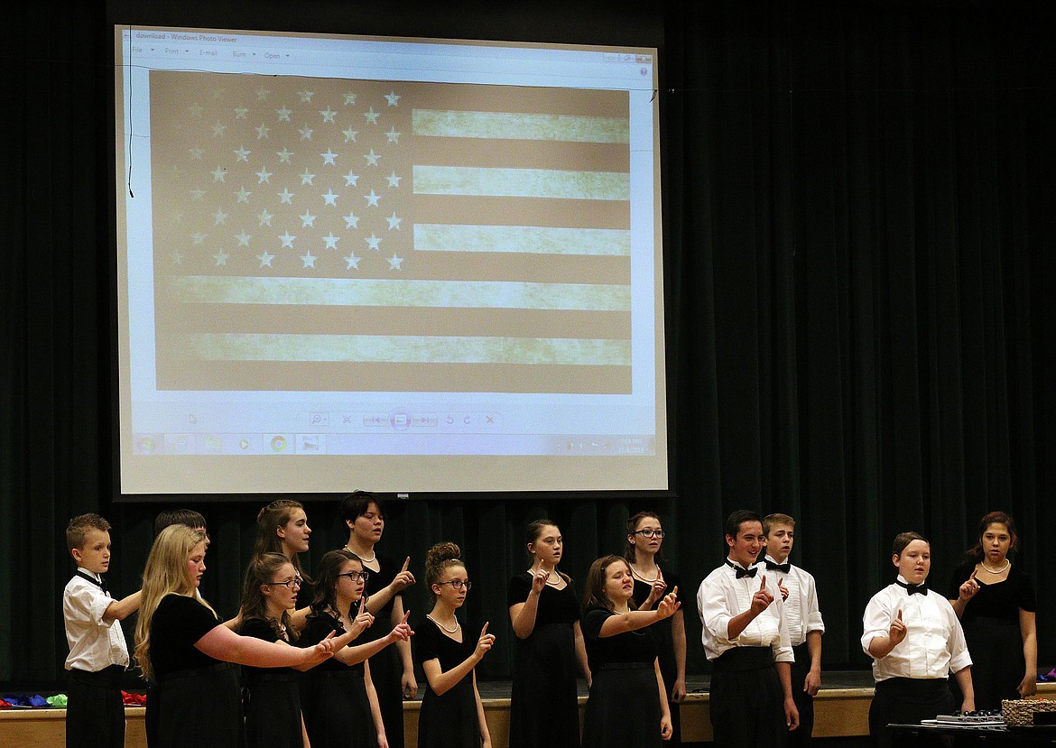 The Libby Middle School Choir performs during a Patriotic Concert at Libby Memorial Events Center Tuesday evening. The Libby Middle School Honors Choir and Libby Children&#146;s Select Choir also performed, all under the direction of Lorraine Braun. (John Blodgett/The Western News)