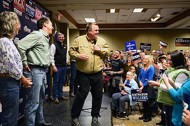 Sen. Jon Tester speaks during a Get Out the Vote rally at the Red Lion Hotel in Kalispell on Saturday. On stage with Tester, is, from left, Kathleen Williams, Democratic candidate for the U.S. House of Representatives; Gov. Steve Bullock; Rex Renk, Democratic candidate for clerk of the Montana Supreme Court; and Andy Shirtliff, Democratic candidate for Public Service Commission, District 5. (Casey Kreider/Daily Inter Lake)