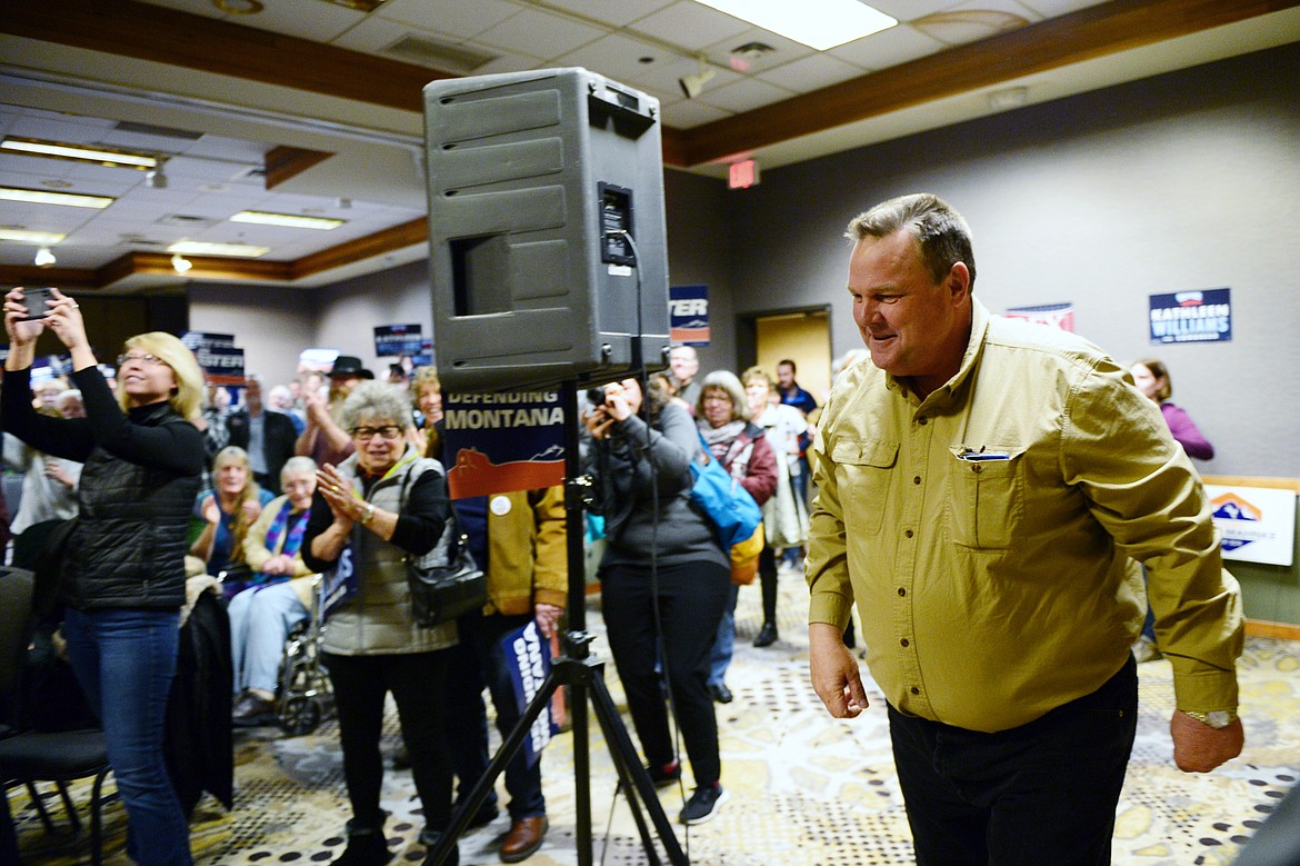 Sen. Jon Tester walks to the stage during a Get Out the Vote rally at the Red Lion Hotel in Kalispell on Saturday. (Casey Kreider/Daily Inter Lake)