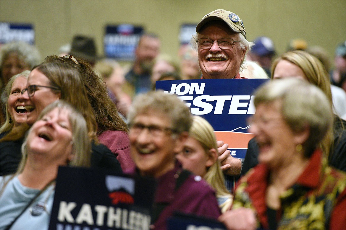 Attendees laugh during speeches at a Get Out the Vote rally at the Red Lion Hotel in Kalispell on Saturday. (Casey Kreider/Daily Inter Lake)