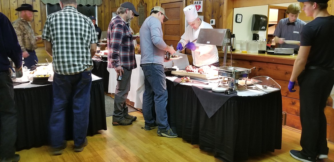 Photo by MANDI BATEMAN
The Kootenai River Inn catered the prime rib dinner for the Ducks Unlimited crowd.