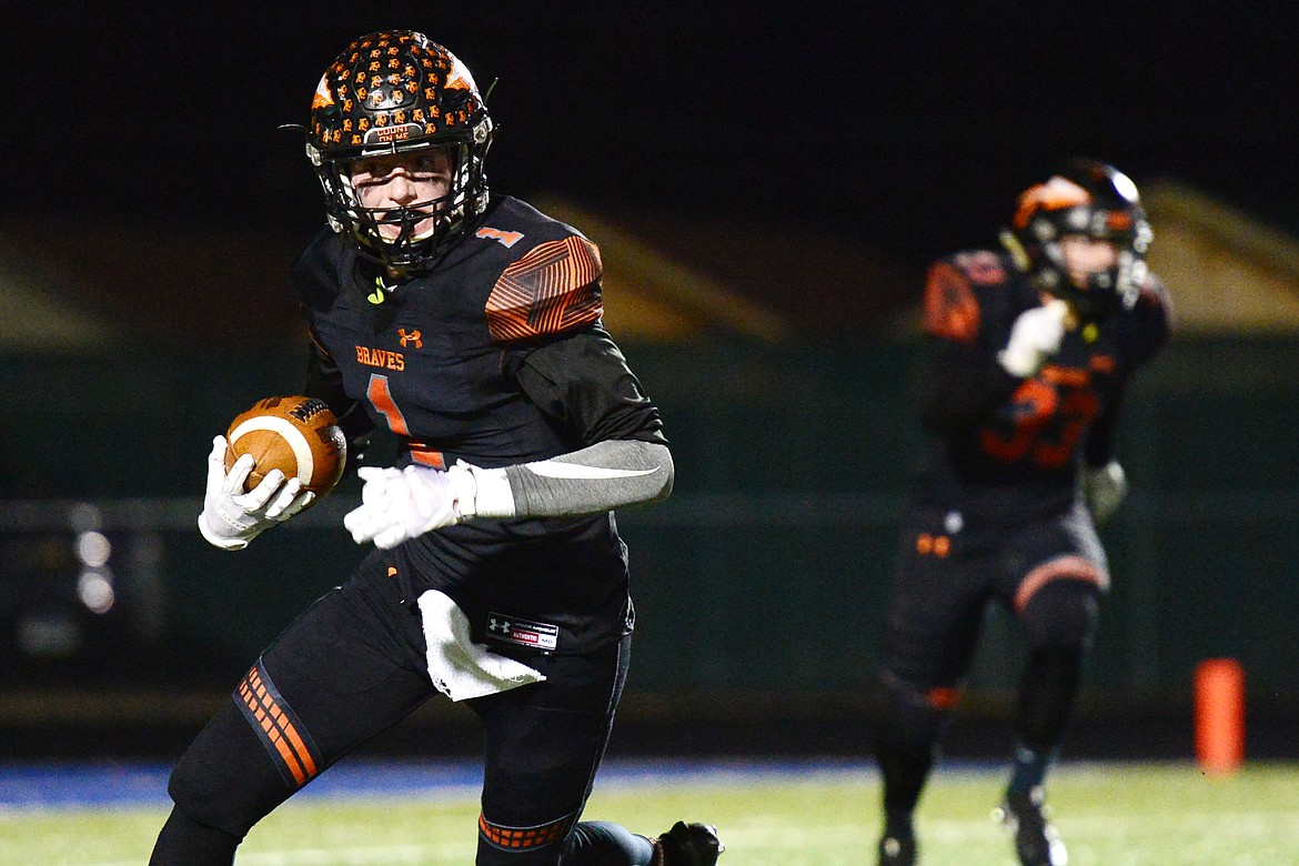 Flathead's Logan Siblerud (1) returns a first-half interception against Billings Senior in a Class AA quarterfinal playoff game at Legends Stadium on Friday. (Casey Kreider/Daily Inter Lake)