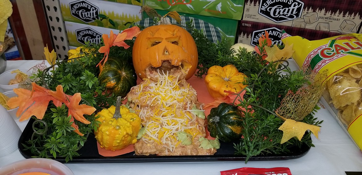 Photo by MANDI BATEMAN
Businesses got into the Halloween spirit, like this demo display at Super 1 Foods designed by cake decorator Kasandra Lecrenski.