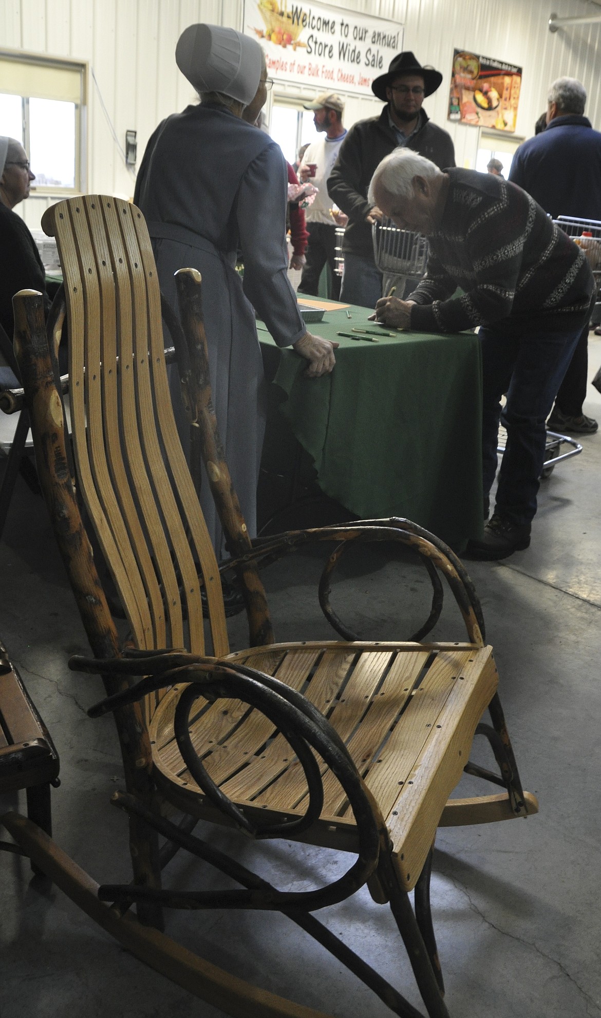 Each year, an Amish-crafted rocking chair is given at the annual Mission General Store customer appreciation day.