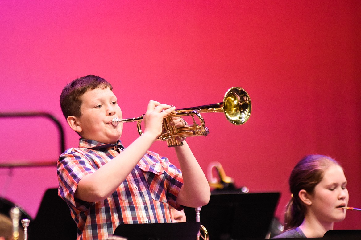 Grayson Calles belts out an improvised solo during the fall band concert last Thursday at the Performing Arts Center.