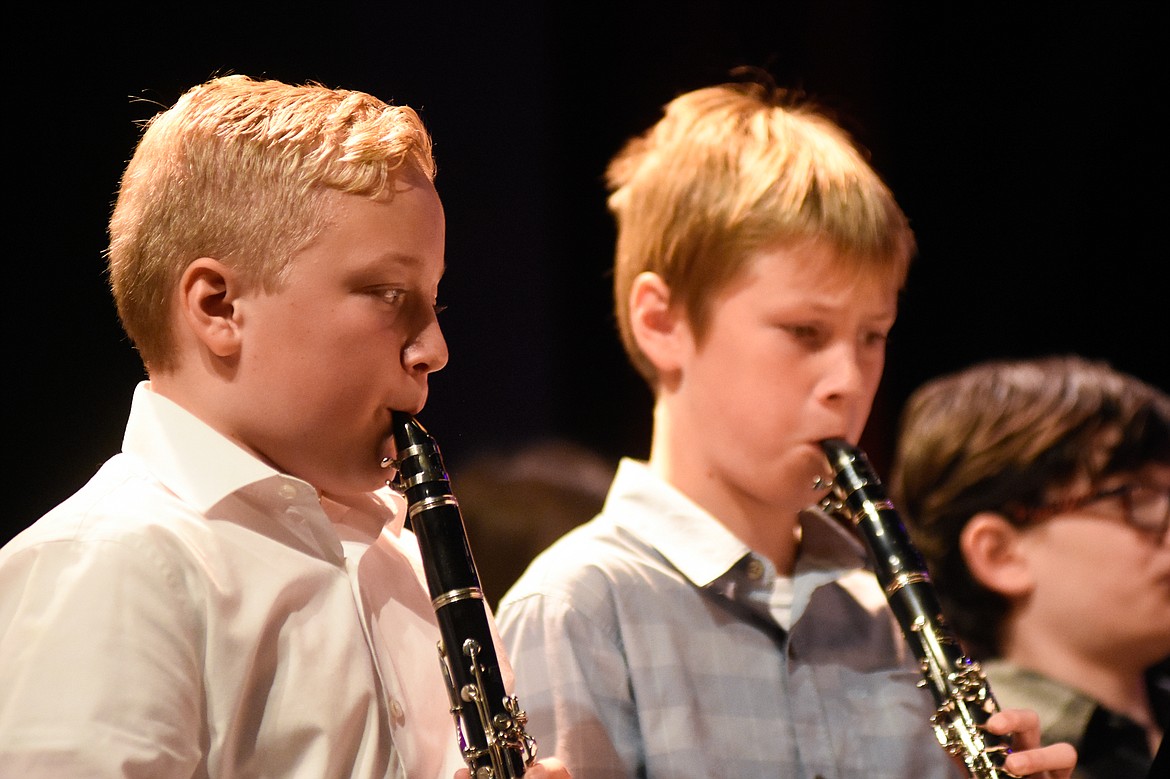 Ryker Sutton and Vaughn Irwin focus on their music during their fall concert last Thursday at the Performing Arts Center.