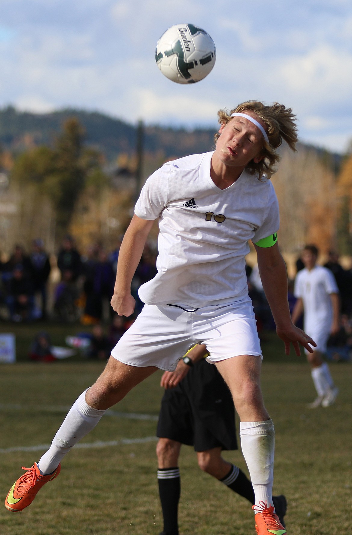 Polson senior Bridger Wenzel heads a ball during the state championship game against Whitefish.