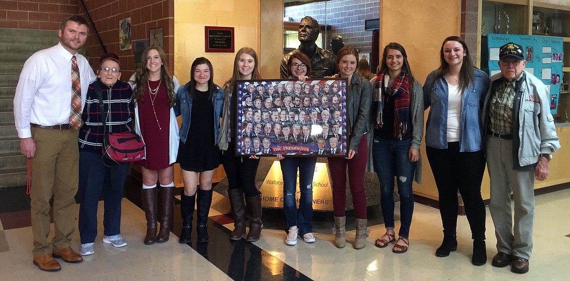 Courtesy photo
Students at Wallace Jr./Sr. High School were gifted this puzzle courtesy of Montana couple Joanie and Bill Merriman. Pictured from the left are Chris Lund, Joanie Merriman, Catie Sheppard, Hannah Garitone, Cassie Heiden, Chole Howell, Kali Davis, Aby Roy, Maggie Howard and Bill Merriman.