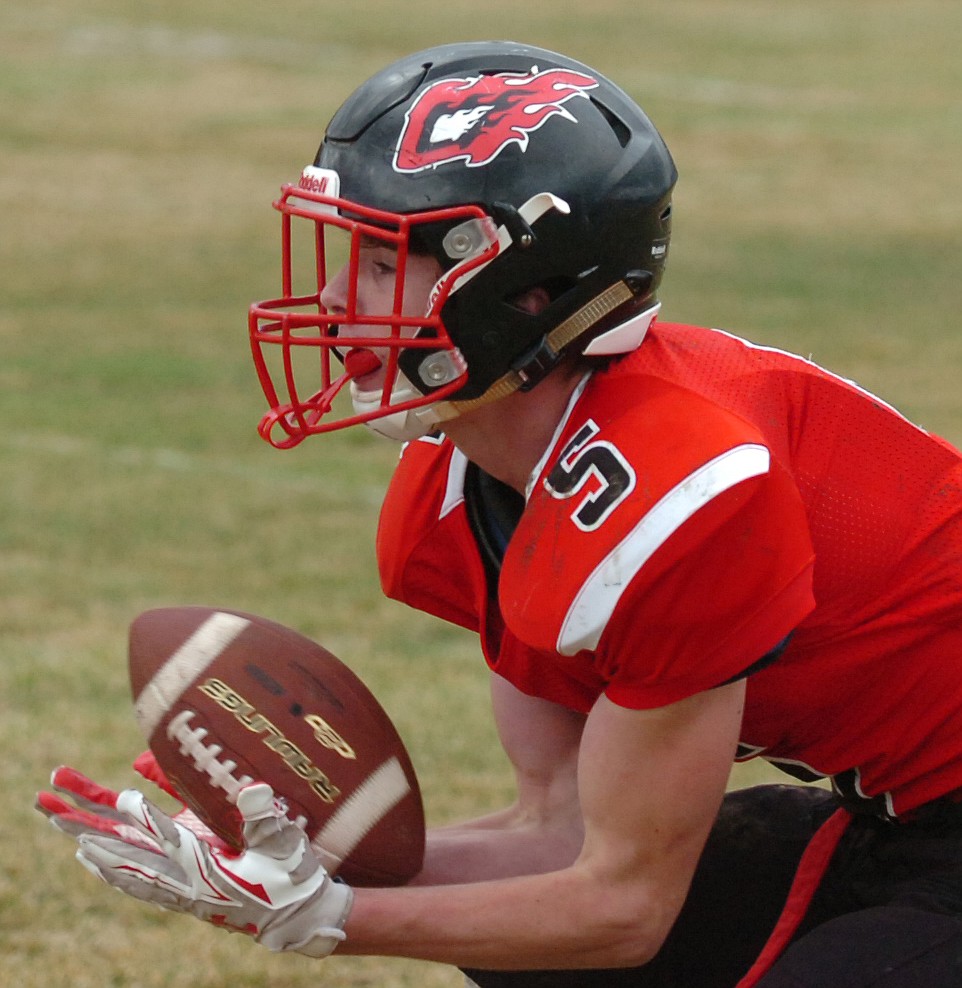 Hot Springs freshman Kyle Lawson snags a pass from Brandon Knudsen en route to a 35-yard touchdown against Jordan.