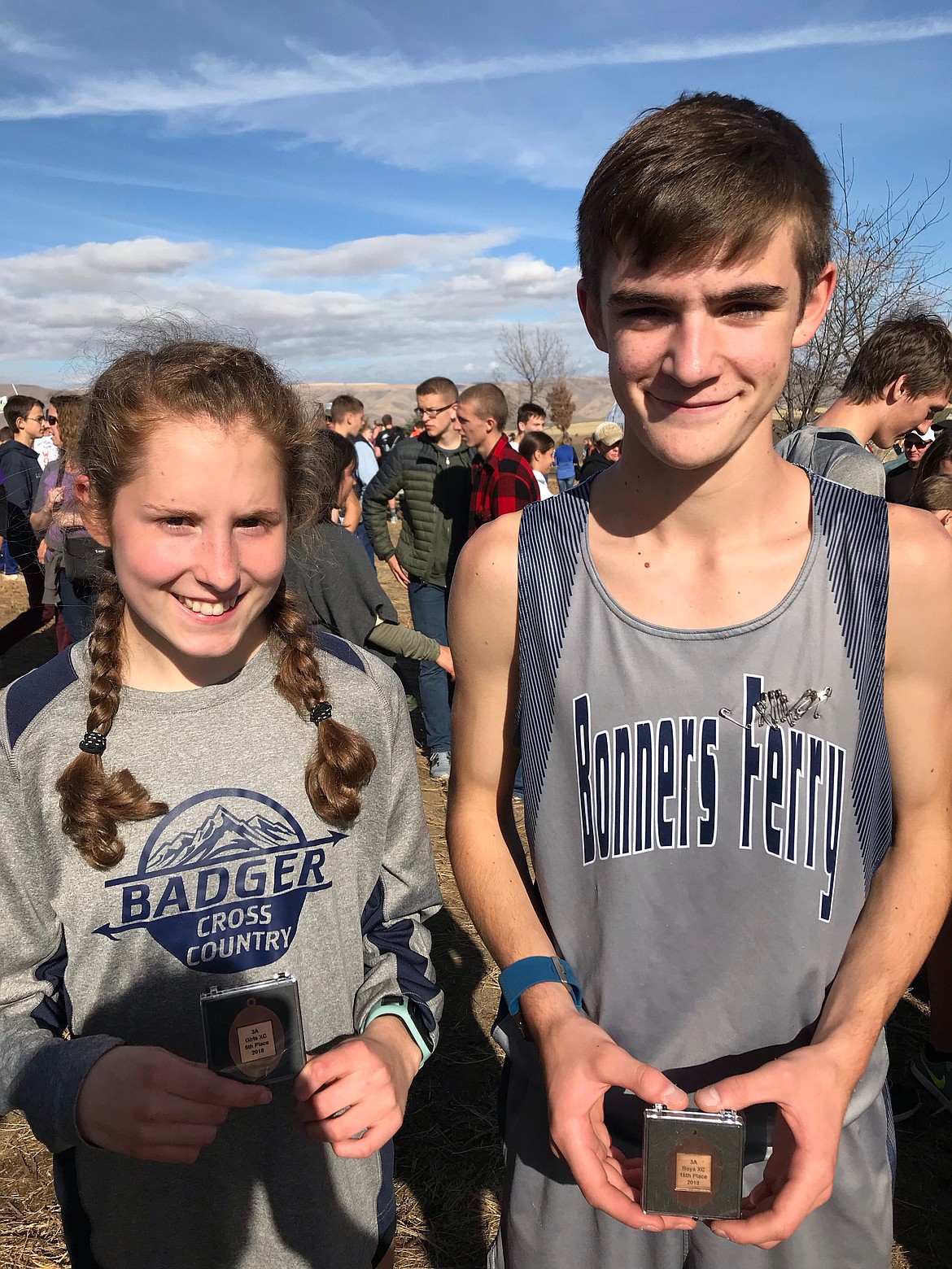 Photos by TYLER WARNER
Abby Gorton and Hunter Smith with their medals. Gorton finished fifth in the 3A girls state meet, and Smith was 16th in the boys&#146; race.