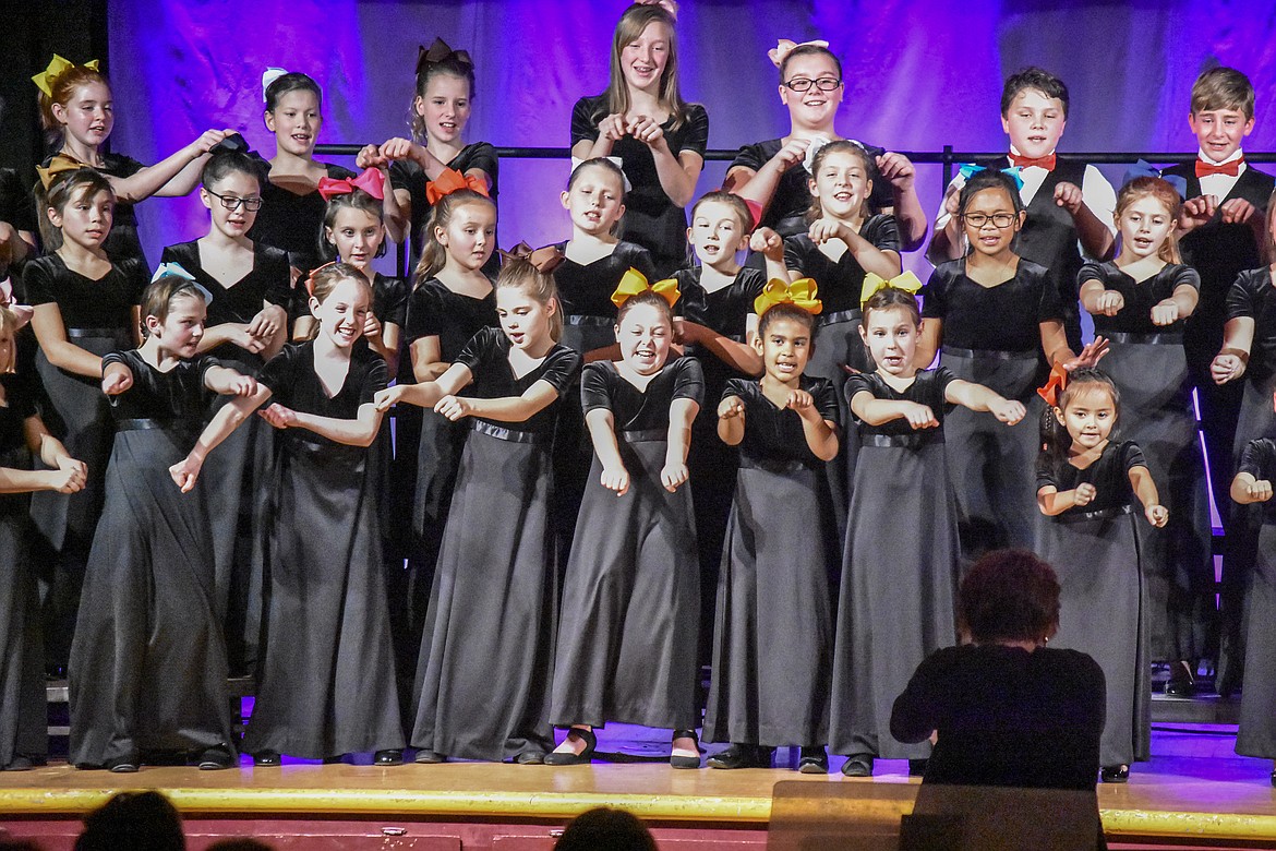 The Libby Children&#146;s Select Choir, directed by Lorraine Braun, performs during the Northwest Montana Chorale Express Festival held in the Troy High School auditorium Monday, Oct. 29. (Ben Kibbey/The Western News)