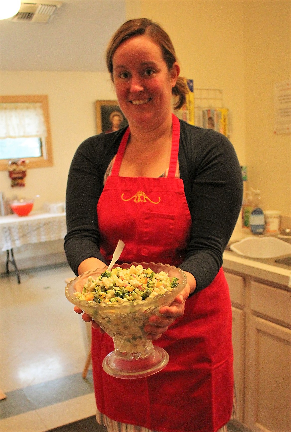 Jess Nagy holds a bowl of Stella&#146;s salad, which has remained a popular favorite at the dinner she started 19 years ago at the St. Albert the Great Catholic Church in Alberton.