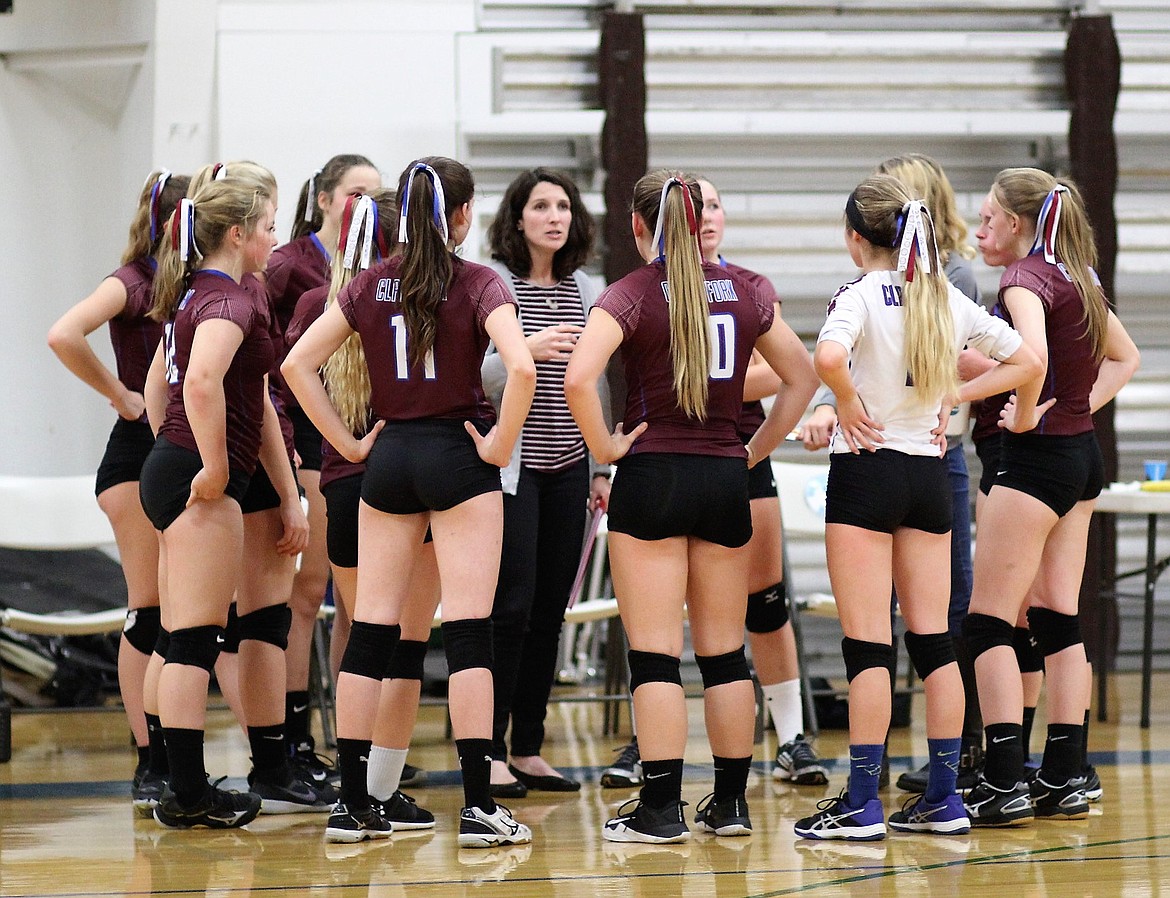 Clark Fork Lady Mountain Cats head coach Toni Labbe talks to her team in Missoula at Districts. The Cats won the Western 13C Districts and traveled to Manhattan Christian for Western C Divisionals where they lost two matches and their chance for a state berth. Host Manhattan Christian won the tournament with Ennis in second place. State will be held in Bozeman Nov. 8-10. (Kathleen Woodford/Mineral Independent)