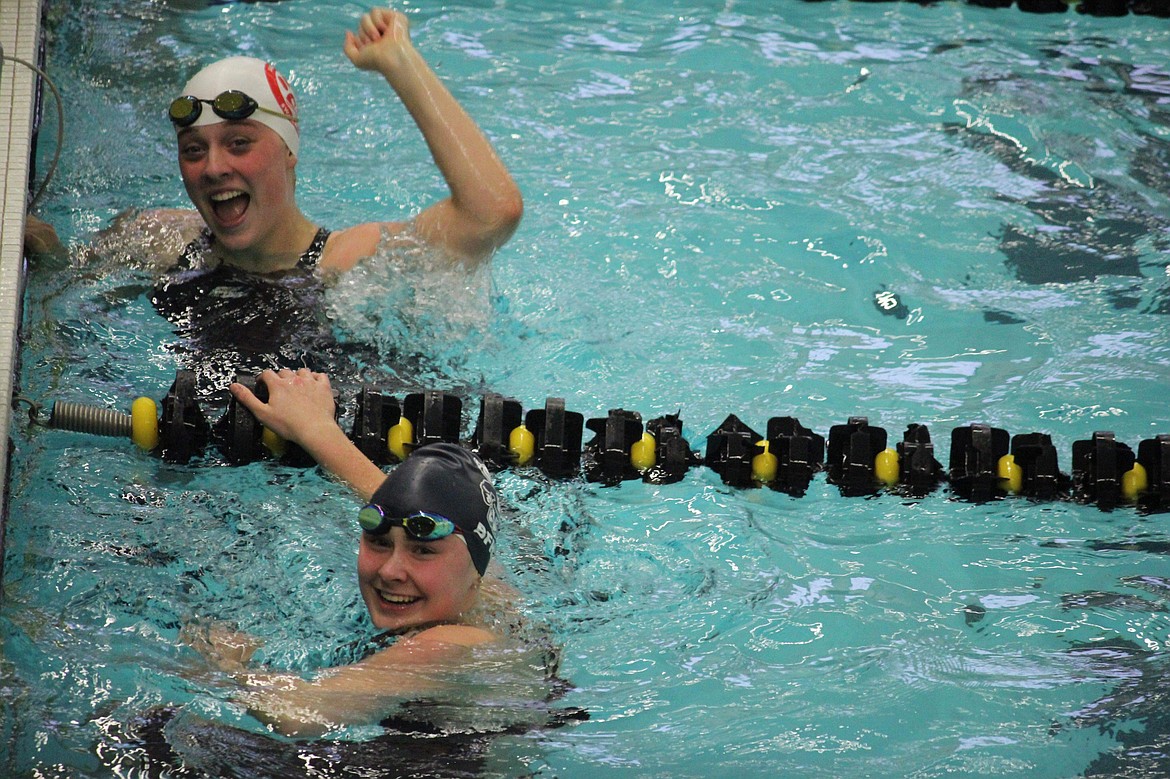 The finish of the 50-yard freestyle where Julia Cummings (front) placed second.