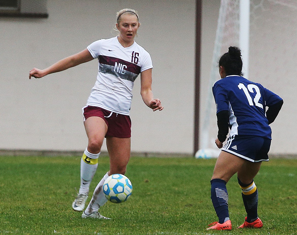 LOREN BENOIT/Press
North Idaho College midfielder Ellory Ferris dribbles the ball around Portland Community College midfielder Sierra Warren in Wednesday&#146;s Northwest Athletic Conference soccer match at Eisenwinter Field. Ferris scored in the 96th minute to give NIC a 1-0 win.