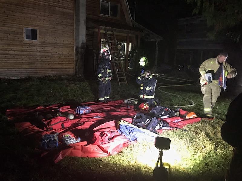 (Courtesy Photo)
Firefighters on scene at the house fire on Ridgewood Road.