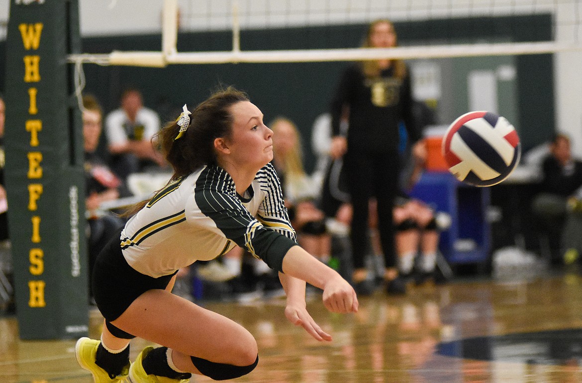 Kaiah Moore makes the diving play against Stevensville in the Western A Divisional Tournament last week at Whitefish High School. (Daniel McKay/Whitefish Pilot)