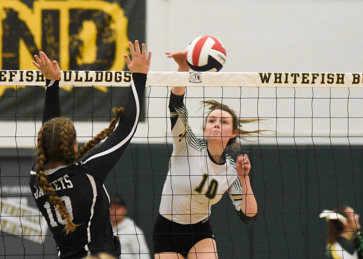 Kaiah Moore gets the kill against Stevensville in the Western A Divisional Tournament last week at Whitefish High School. (Daniel McKay/Whitefish Pilot)