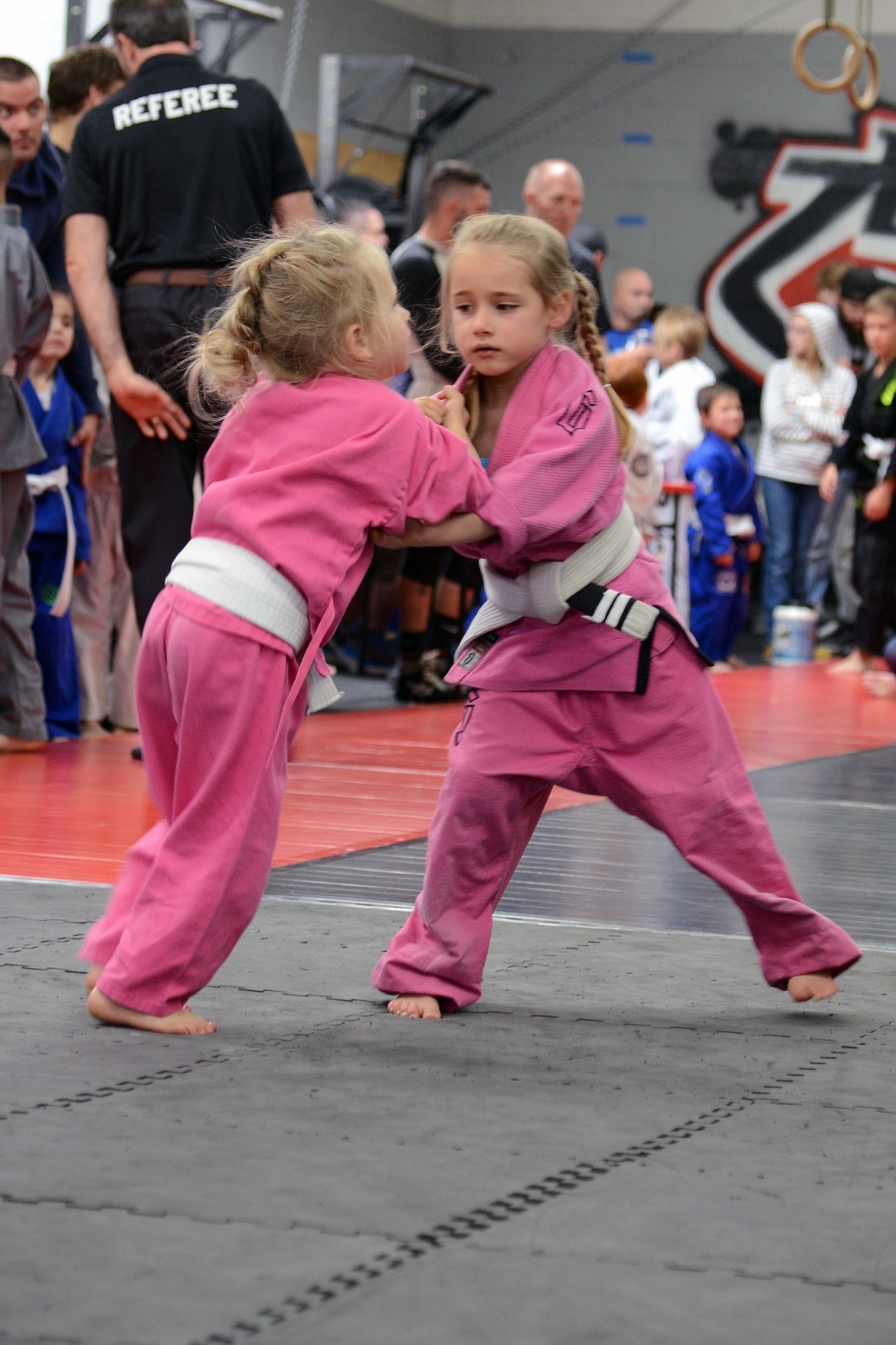 Cheyenne Barras, right, on her way to winning a gold medal.