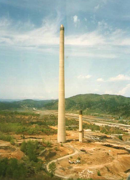 The smoke stacks at the Bunker Hill Smelting Plant are pictured here on the morning of their demolition in 1996. (Courtesy photo)