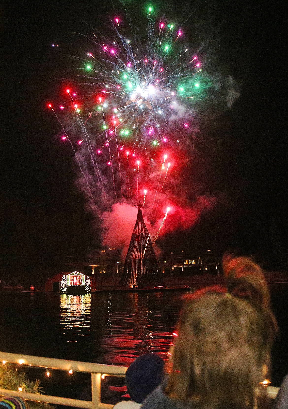 Fireworks explode over a 60-foot tall animated floating Christmas tree at the &#147;North Pole&#148; during a Journey to the North Pole cruise Thursday night. (LOREN BENOIT/Press)