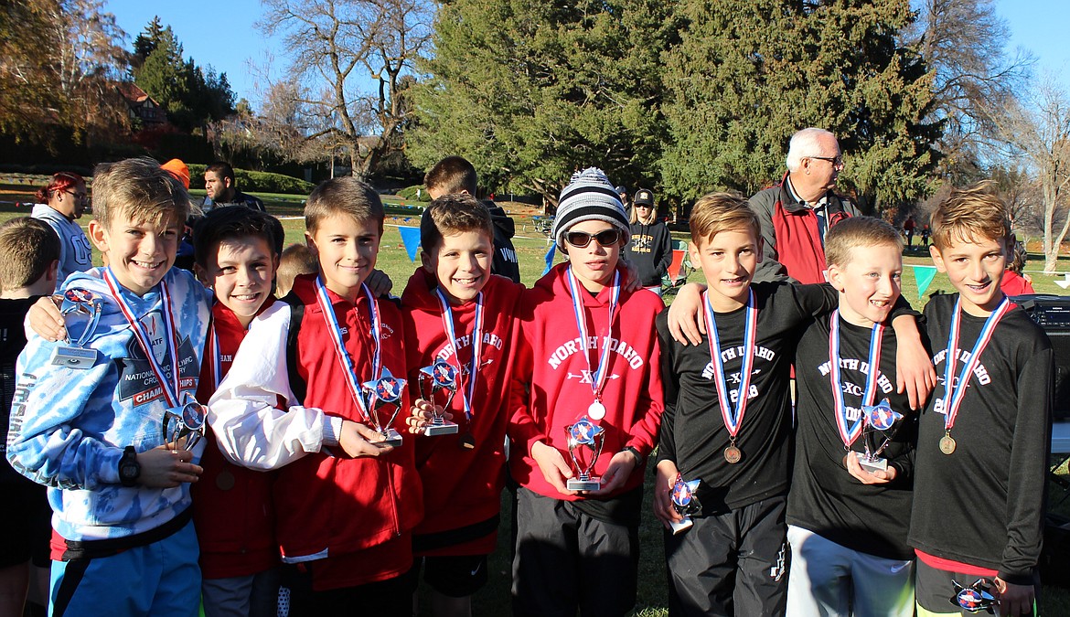 Courtesy photo
The North Idaho Cross Country boys age 11-12 team won its division at the Inland Northwest Association Junior Olympic Cross Country Championships on Saturday in Yakima, Wash. From left are Lachlan May, Ethan Hickok, Lars Bazler, Owen Hickok, Neil McCarthy, Zack Cervi-Skinner, Alex Jones and Max Cervi-Skinner.