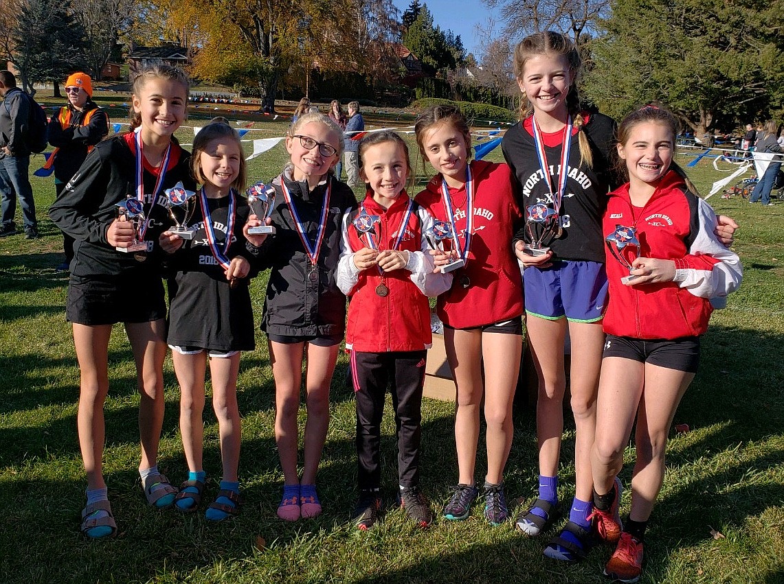 Courtesy photo
The North Idaho Cross Country girls age 11-12 team won its division at the Inland Northwest Association Junior Olympic Cross Country Championships on Saturday in Yakima, Wash. From left are Elliana Rietze, Avery Hickok, Cambrie Stam, Olivia May, Zara Munyer, Jenny Elliott and Neala Hart.